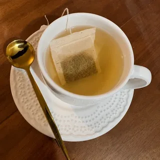 Sonho Dourado - chá de camomila servido em xícara